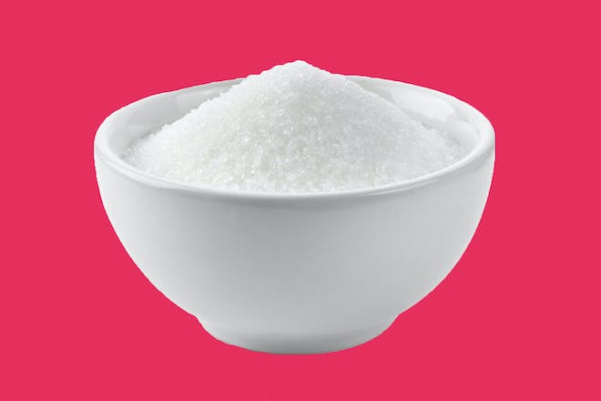 Grains of sugar in a bowl